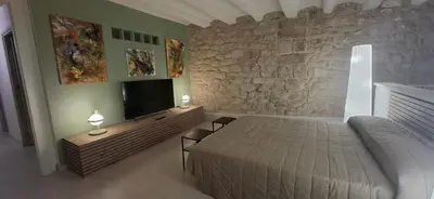 Cama o camas de una habitación en Cal Ton de la Rosa de Castelldans