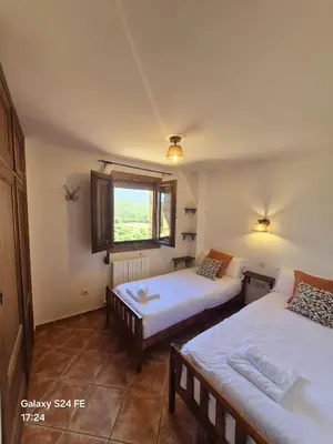 Cama o camas de una habitación en La Casa del Arco