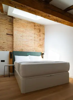Cama o camas de una habitación en Limehome Pamplona Hilarión Eslava