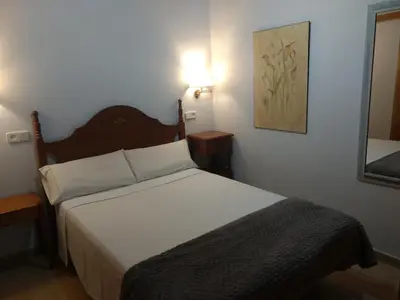 Cama o camas de una habitación en Apartamento con jardin en Gessa