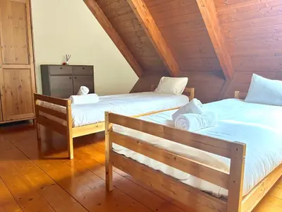 Cama o camas de una habitación en Apartament bonic i amb altell a Esterri by RURAL D'ÀNEU