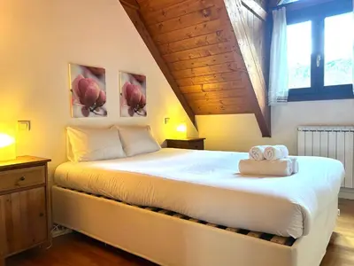 Cama o camas de una habitación en Apartament bonic i amb altell a Esterri by RURAL D'ÀNEU