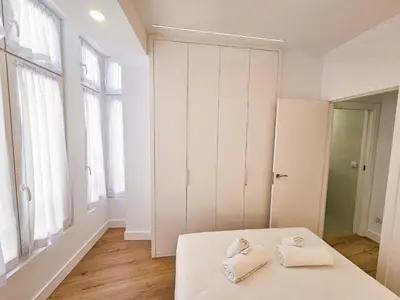 Cama o camas de una habitación en Apartamentos Zaragoza Reconquista 3000