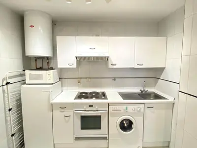 Una cocina o zona de cocina en Portalet III -1ºA