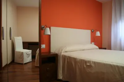 Cama o camas de una habitación en Apartaments Tarrega Lagranja