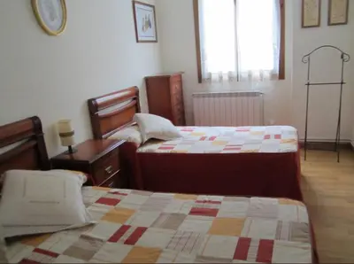 Cama o camas de una habitación en Pensión USOA
