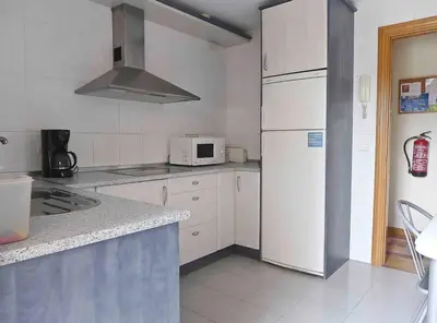 Una cocina o zona de cocina en Pensión USOA