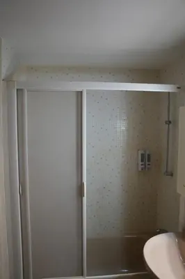 Un baño de Apartamento en La Romareda a 10 min del centro en tranvía - Alfonso Suites