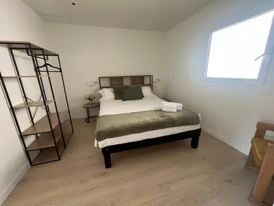 Cama o camas de una habitación en AVA Alojamientos Victoria Arnedo