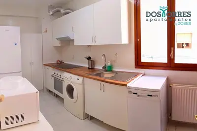 Una cocina o zona de cocina en Dos Torres Nicanor Bussines