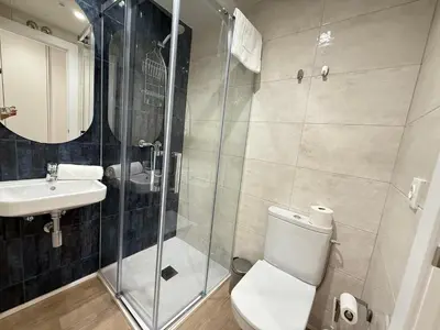 Un baño de Groma Rooms