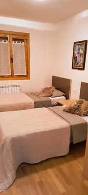 Cama o camas de una habitación en Refugio rural con encanto en el Pirineo