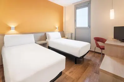 Cama o camas de una habitación en Hotel 280 Zaragoza