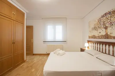 Cama o camas de una habitación en El Corazón de San Juan