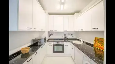 Una cocina o zona de cocina en The Comfortable Apartment by Clabao