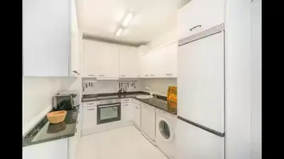 Una cocina o zona de cocina en The Comfortable Apartment by Clabao