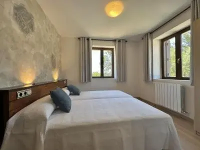 Cama o camas de una habitación en Casa Rural Elizalde