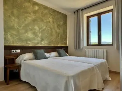 Cama o camas de una habitación en Casa Rural Elizalde