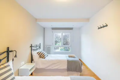 Cama o camas de una habitación en Acogedor apartamento ideal para familias