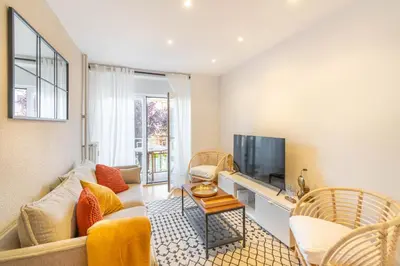 Una televisión o centro de entretenimiento en Acogedor apartamento ideal para familias