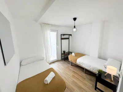 Cama o camas de una habitación en Leyenda del Pilar - Turistea