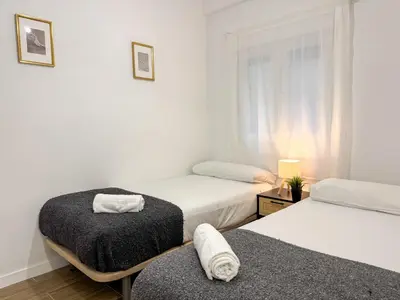 Cama o camas de una habitación en Leyenda del Pilar - Turistea