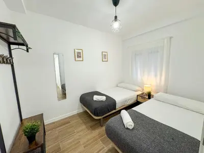 Cama o camas de una habitación en Leyenda del Pilar - Turistea