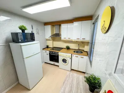 Una cocina o zona de cocina en El Ebro del Pilar - Turistea