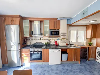 Una cocina o zona de cocina en Cineasta del Pilar - Turistea