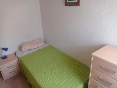 Cama o camas de una habitación en Junto Plaza del Pilar