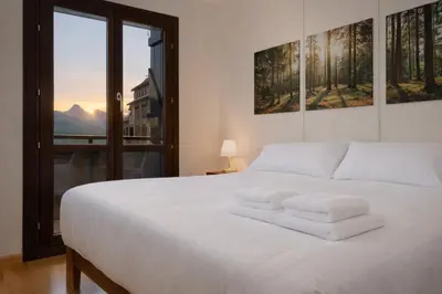 Cama o camas de una habitación en El mirador de Panticosa l WIFI l Garaje l Vistas