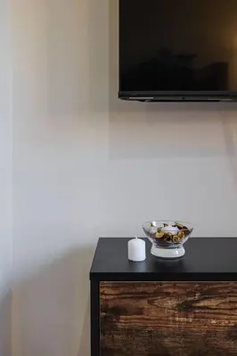 Una televisión o centro de entretenimiento en El mirador de Panticosa l WIFI l Garaje l Vistas
