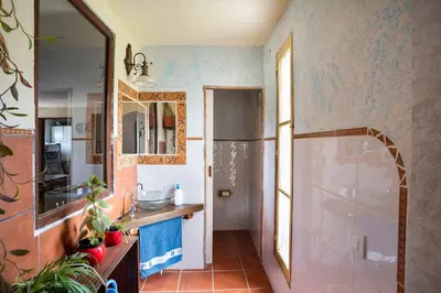Un baño de Vivienda de Turismo Rural Granja La Lomica