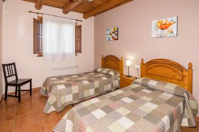 Cama o camas de una habitación en Ruralracons