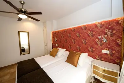 Cama o camas de una habitación en El Canton De Carlos