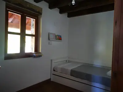 Cama o camas de una habitación en Apartamentos El Plano
