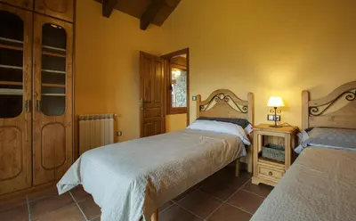 Cama o camas de una habitación en Casa Rural O Fraginal