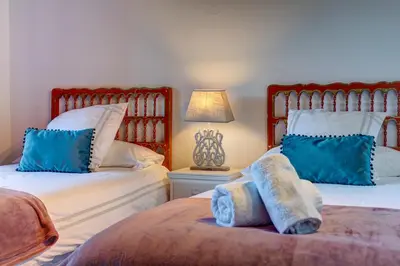 Cama o camas de una habitación en Eth Floc - Dúplex con trasslado gratuito a pistas