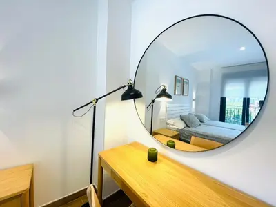 Cama o camas de una habitación en Apartamentos San Nicolas Jaca