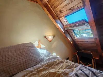 Cama o camas de una habitación en Dúplex acogedor con chimenea cerca de Aigüestortes - Falcó 6