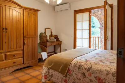 Cama o camas de una habitación en Casa rural La Plana