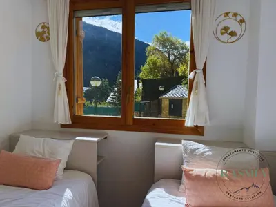 Cama o camas de una habitación en Rasmia Canfranc Estación