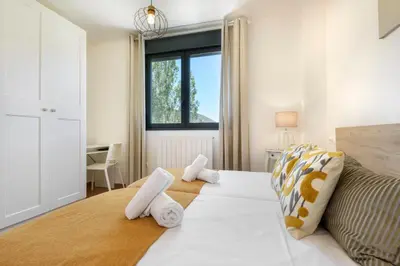 Cama o camas de una habitación en Mi trocito de Sabiñanigo, wifi y garaje