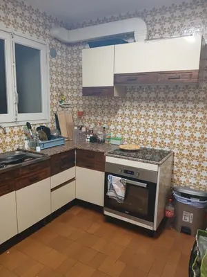 Una cocina o zona de cocina en Habitación en alquiler