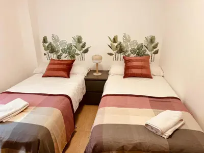 Cama o camas de una habitación en Céntrico alojamiento las armas 13