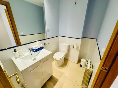 Un baño de Céntrico alojamiento las armas 13