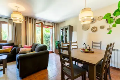 Zona de estar de Paramita Adosado con Jardin