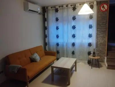 Zona de estar de Calatorao apartamentos completos con jardín