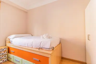 Cama o camas de una habitación en Your Home in the Heart of Zaragoza