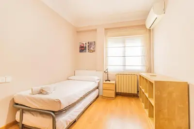 Cama o camas de una habitación en Your Home in the Heart of Zaragoza